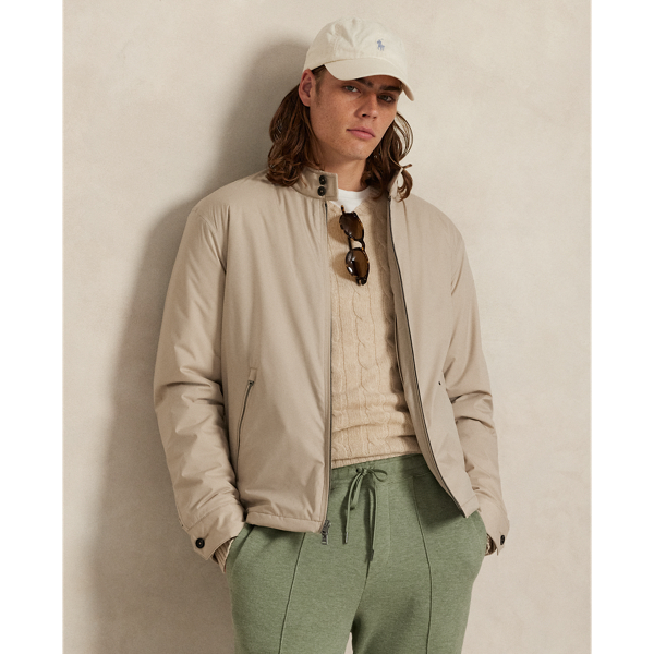 This jacket is crafted from water-resistant twill and insulated with ultra-lightweight down-alternative fill. Thoughtfully constructed, it features suede and leather details as well as a comfortable stretch jersey lining.