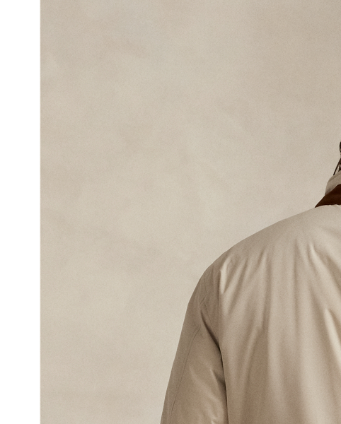 This jacket is crafted from water-resistant twill and insulated with ultra-lightweight down-alternative fill. Thoughtfully constructed, it features suede and leather details as well as a comfortable stretch jersey lining.