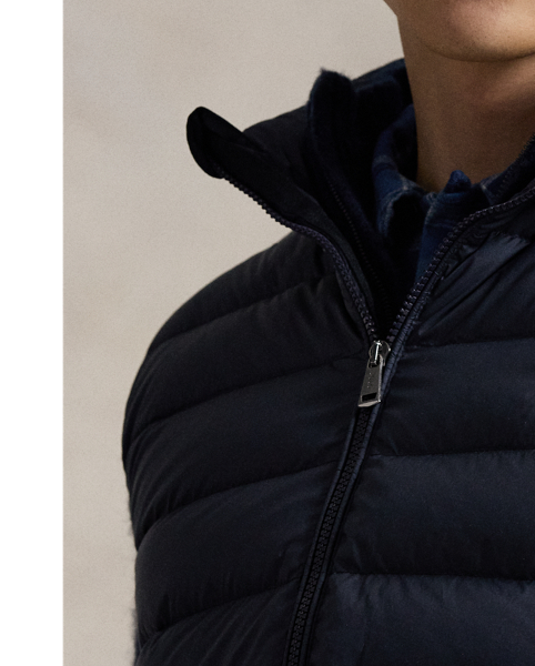 This gilet is crafted from a matte water-repellent fabric and insulated with 650-fill-power down. It also packs into its own pocket for on-the-go convenience.