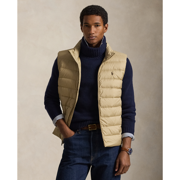 This gilet is crafted from a matte water-repellent fabric and insulated with 650-fill-power down. It also packs into its own pocket for on-the-go convenience.