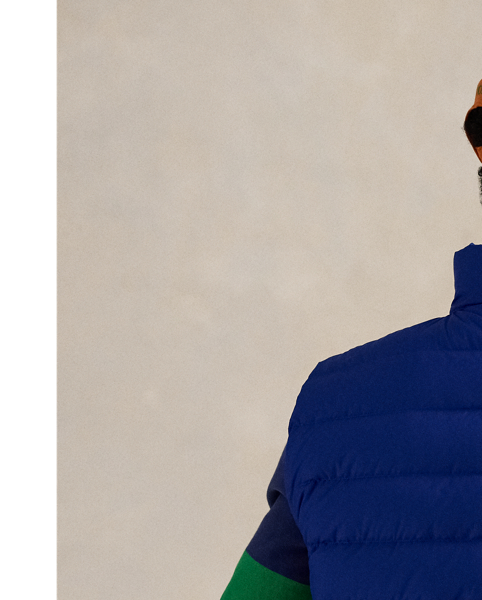 This gilet is crafted from a matte water-repellent fabric and insulated with 650-fill-power down. It also packs into its own pocket for on-the-go convenience.