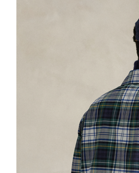 As a boy growing up in the Bronx, Mr Lauren loved going to Yankee Stadium™ to watch his hometown heroes play ball. This plaid unisex jacket celebrates Mr Lauren's long-standing love of the Bronx Bombers™ and the game of baseball with a New York Yankees™ logo patch. Finished with " Ralph Lauren Lauren" embroidery, it playfully combines the silhouette of a windbreaker with classic oxford cloth.