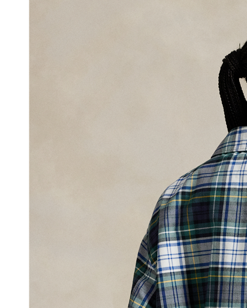 As a boy growing up in the Bronx, Mr Lauren loved going to Yankee Stadium™ to watch his hometown heroes play ball. This plaid unisex jacket celebrates Mr Lauren's long-standing love of the Bronx Bombers™ and the game of baseball with a New York Yankees™ logo patch. Finished with " Ralph Lauren Lauren" embroidery, it playfully combines the silhouette of a windbreaker with classic oxford cloth.