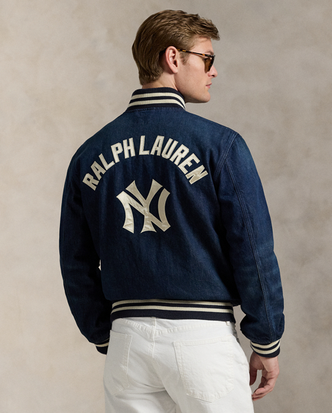 As a boy growing up in the Bronx, Mr Lauren loved going to Yankee Stadium™ to watch his hometown heroes play ball. This unisex jacket celebrates Mr Lauren's long-standing love of the Bronx Bombers™ and the game of baseball with a New York Yankees™ logo patch. Made from classic cotton denim, it features the " Ralph Lauren Lauren" logo rendered in embroidery and appliqués.