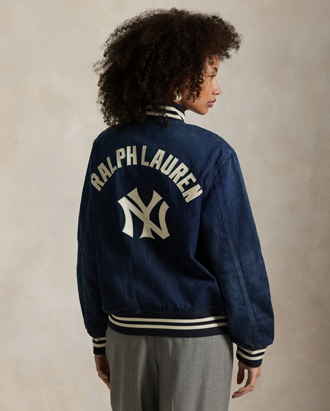 As a boy growing up in the Bronx, Mr Lauren loved going to Yankee Stadium™ to watch his hometown heroes play ball. This unisex jacket celebrates Mr Lauren's long-standing love of the Bronx Bombers™ and the game of baseball with a New York Yankees™ logo patch. Made from classic cotton denim, it features the " Ralph Lauren Lauren" logo rendered in embroidery and appliqués.