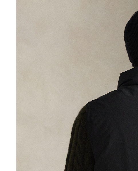 In cotton-blend faille, this gilet is insulated with 650-fill-power down and built with an array of utility pockets.