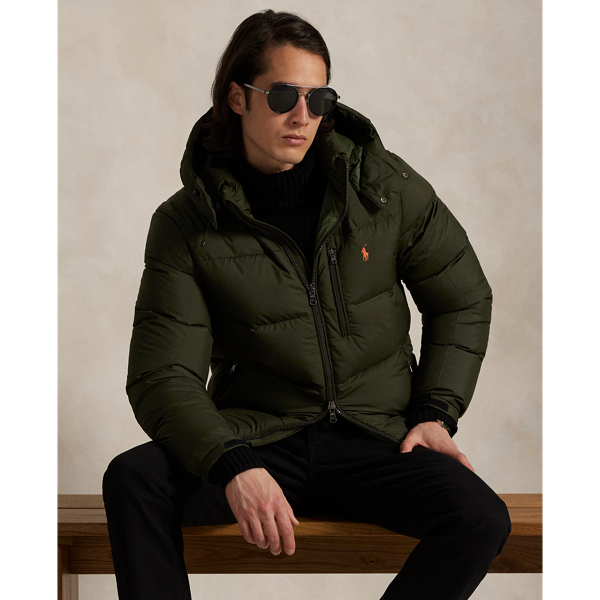 Made from water-repellent ripstop fabric, this jacket is insulated with 650-fill-power down and constructed with a detachable hood.