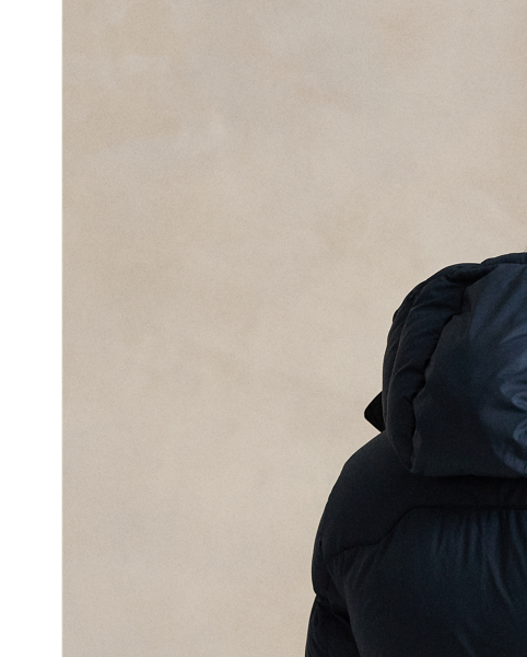 Made from water-repellent ripstop fabric, this jacket is insulated with 650-fill-power down and constructed with a detachable hood.