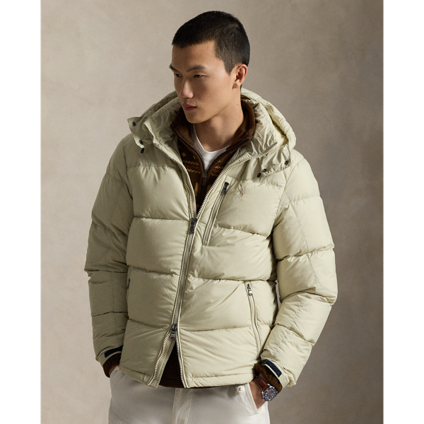 Made from water-repellent ripstop fabric, this jacket is insulated with 650-fill-power down and constructed with a detachable hood.