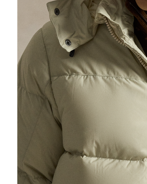 Made from water-repellent ripstop fabric, this jacket is insulated with 650-fill-power down and constructed with a detachable hood.