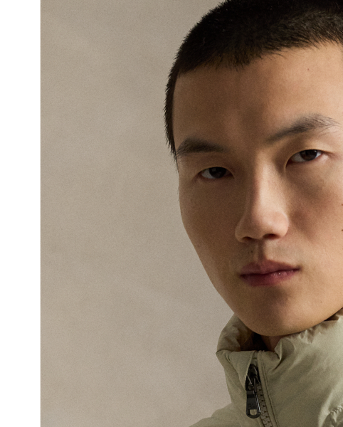 Made from water-repellent ripstop fabric, this jacket is insulated with 650-fill-power down and constructed with a detachable hood.