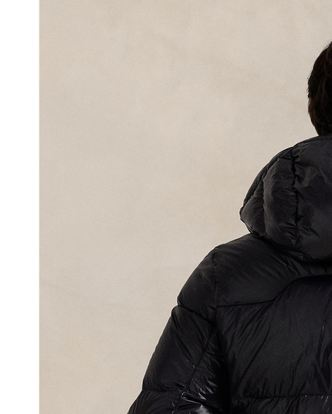 Made from water-repellent ripstop fabric, this glossed jacket is insulated with 650-fill-power down and constructed with a detachable hood.