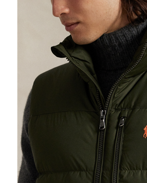 This gilet is made from water-repellent ripstop and insulated with 650-fill-power down, which work together to help keep you warm and dry.