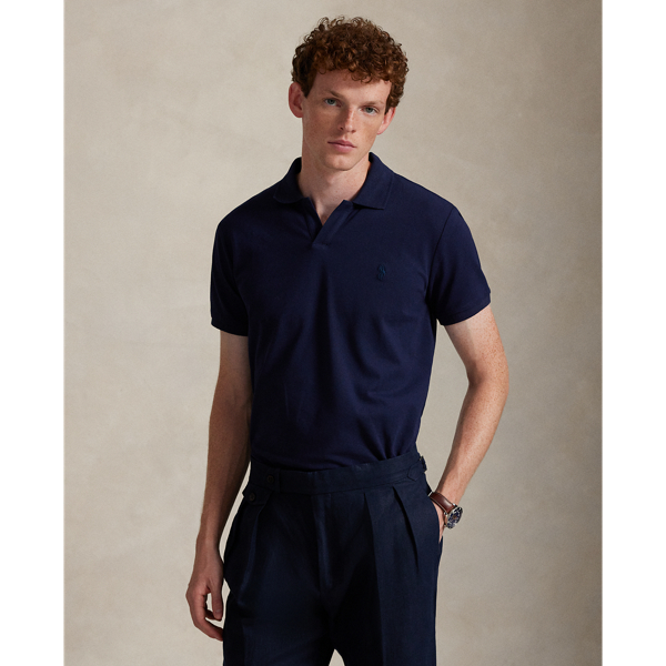 This Johnny-collar shirt includes a hint of stretch, allowing for unparalleled ease of movement and comfort. It is finished with our signature embroidered Pony on the left chest.