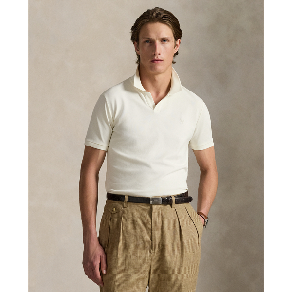 This Johnny-collar shirt includes a hint of stretch, allowing for unparalleled ease of movement and comfort. It is finished with our signature embroidered Pony on the left chest.