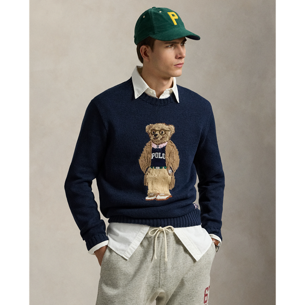The Collegiate Bear debuted in 1996 in the form of a Steiff plush bear and, six years later, was voted by Polo fans to appear on a jumper for the first time in  Ralph Lauren Lauren history. Now, the Collegiate Bear is back and with a few stylish updates – tortoiseshell glasses and a Polo-emblazoned pullover. Nonetheless, just like the original, the hand-stitched "RL" initials on the hem are in the same shade as the bear's pink oxford shirt.