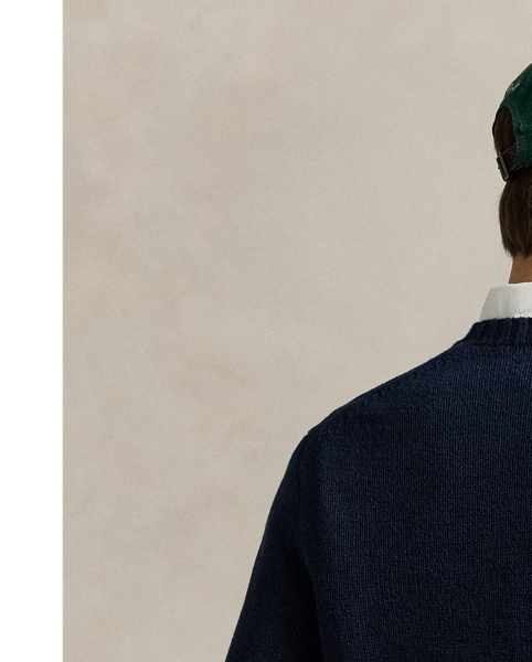 The Collegiate Bear debuted in 1996 in the form of a Steiff plush bear and, six years later, was voted by Polo fans to appear on a jumper for the first time in  Ralph Lauren Lauren history. Now, the Collegiate Bear is back and with a few stylish updates – tortoiseshell glasses and a Polo-emblazoned pullover. Nonetheless, just like the original, the hand-stitched "RL" initials on the hem are in the same shade as the bear's pink oxford shirt.