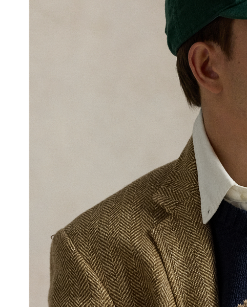 The Collegiate Bear debuted in 1996 in the form of a Steiff plush bear and, six years later, was voted by Polo fans to appear on a jumper for the first time in  Ralph Lauren Lauren history. Now, the Collegiate Bear is back and with a few stylish updates – tortoiseshell glasses and a Polo-emblazoned pullover. Nonetheless, just like the original, the hand-stitched "RL" initials on the hem are in the same shade as the bear's pink oxford shirt.