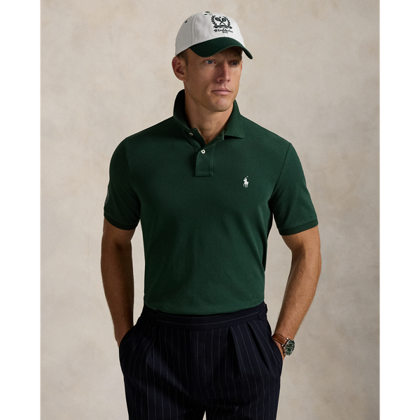 Part of our collection celebrating Wimbledon 2025, this unisex cotton Polo shirt is embroidered with our signature Pony and the official "The Championships Wimbledon" logo. It is dyed and washed to achieve distinct tonal nuances that provide a unique character to the cloth.