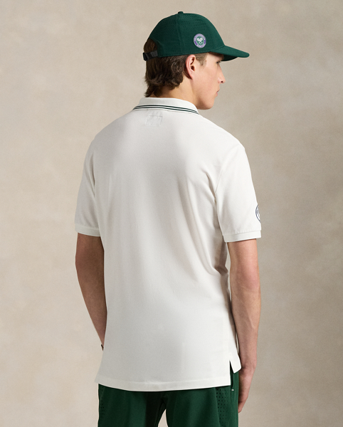 Part of our collection celebrating Wimbledon 2025, this Polo shirt features the tournament's official logo and our signature embroidered Pony. It is made from a comfortable stretch mesh fabric, which is developed with moisture-wicking properties.