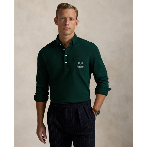 Part of our collection celebrating Wimbledon 2025, this unisex Polo shirt is embroidered with the tournament's logo and location, which includes its "SW19" postcode. Our signature embroidered Pony and genuine mother-of-pearl buttons adorn this cotton mesh style.