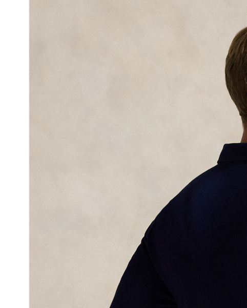 Part of our collection celebrating Wimbledon 2025, this unisex Polo shirt is embroidered with the tournament's logo and location, which includes its "SW19" postcode. Our signature embroidered Pony and genuine mother-of-pearl buttons adorn this cotton mesh style.