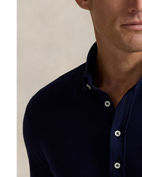 Part of our collection celebrating Wimbledon 2025, this unisex Polo shirt is embroidered with the tournament's logo and location, which includes its "SW19" postcode. Our signature embroidered Pony and genuine mother-of-pearl buttons adorn this cotton mesh style.