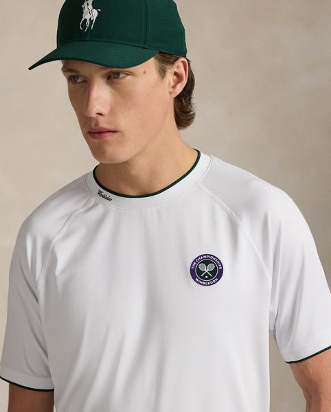 Part of our collection celebrating Wimbledon 2025, this unisex T-shirt features the tournament's official logo patch and our signature Pony. Its jacquard mesh fabric is developed with moisture-wicking properties to help keep you cool and comfortable.