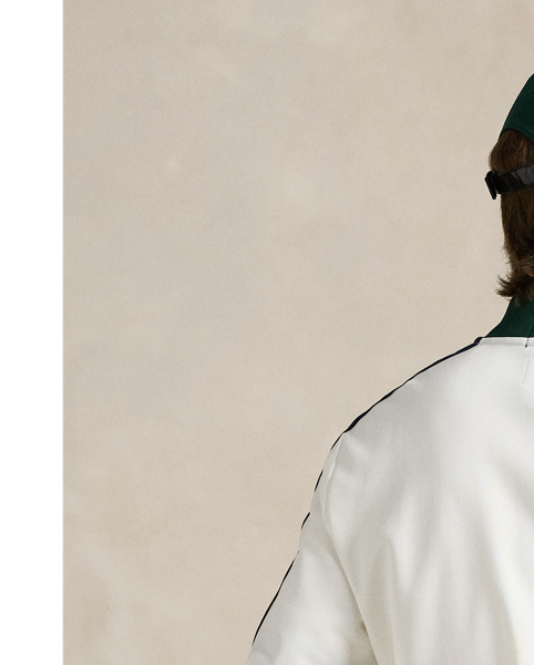 Part of our collection celebrating Wimbledon 2025, this unisex track jacket features a tennis-inspired "Polo  Ralph Lauren Lauren" crest and the tournament's logo intricately embroidered at the front. It is crafted from heavyweight tricot fabric and finished with sporty stripes at the sleeves.