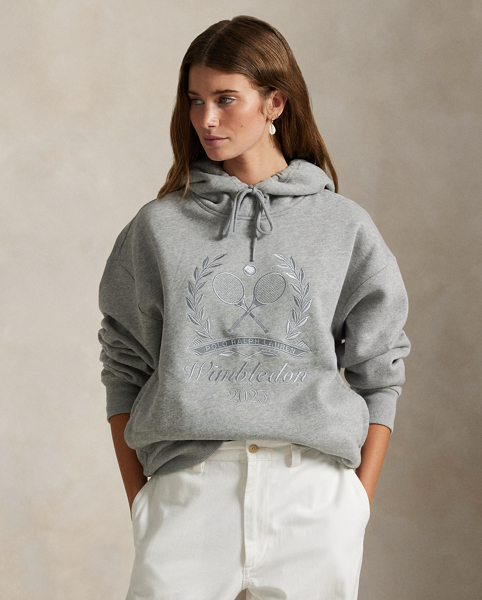 Part of our collection celebrating Wimbledon 2025, this unisex cotton-blend hoodie features a tennis-inspired "Polo Ralph Lauren Lauren" crest and the tournament's logo intricately embroidered on the front.