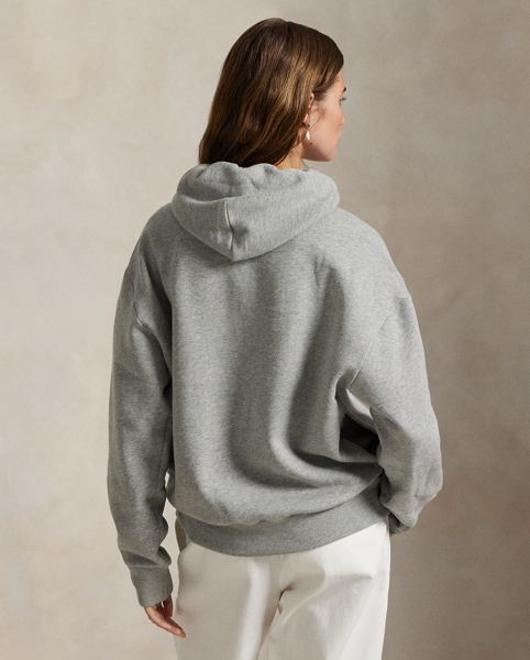 Part of our collection celebrating Wimbledon 2025, this unisex cotton-blend hoodie features a tennis-inspired "Polo Ralph Lauren Lauren" crest and the tournament's logo intricately embroidered on the front.