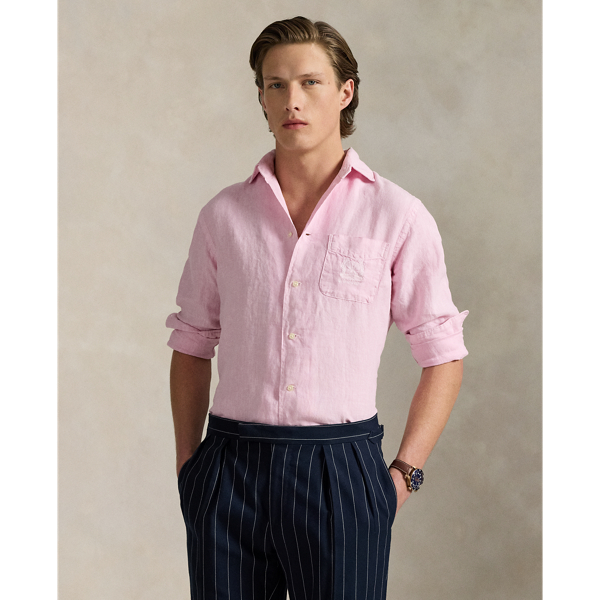 Part of our collection celebrating Wimbledon 2025, this unisex linen shirt features a tennis-inspired "Polo Ralph Lauren Lauren" crest and the tournament's logo intricately embroidered on the chest pocket.