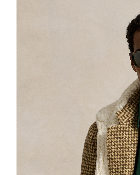 Part of our collection celebrating Wimbledon 2025, this unisex shirt features a tennis-inspired crest combining the tournament's logo and "Polo  Ralph Lauren Lauren". It is garment-dyed and washed to create tonal dimension and impart a soft texture.