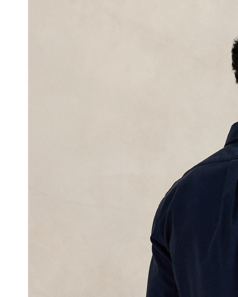 Part of our collection celebrating Wimbledon 2025, this unisex shirt features a tennis-inspired crest combining the tournament's logo and "Polo  Ralph Lauren Lauren". It is garment-dyed and washed to create tonal dimension and impart a soft texture.