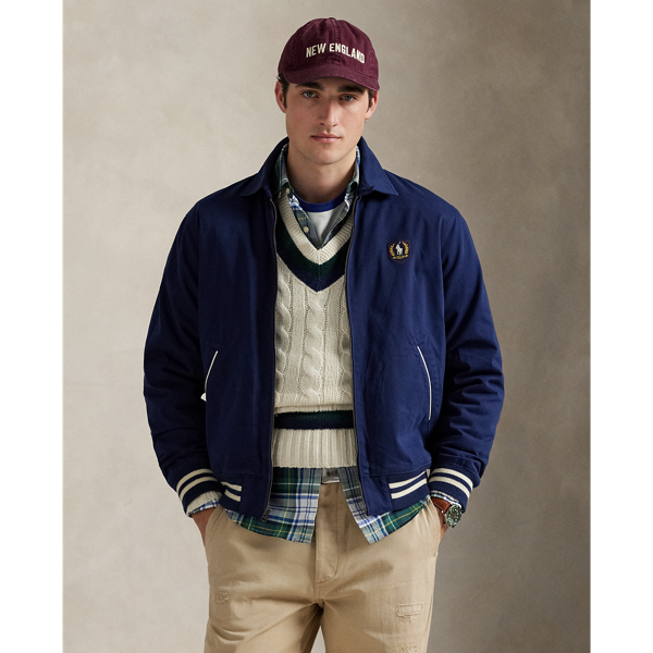 With its sporty silhouette and cotton twill construction, this jacket combines timeless athletic style with heritage craftsmanship. The vintage collegiate-inspired patch on the left chest features archival artwork along with the iconic Polo Pony.