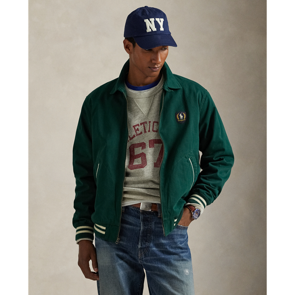 With its sporty silhouette and cotton twill construction, this jacket combines timeless athletic style with heritage craftsmanship. The vintage collegiate-inspired patch on the left chest features archival artwork along with the iconic Polo Pony.