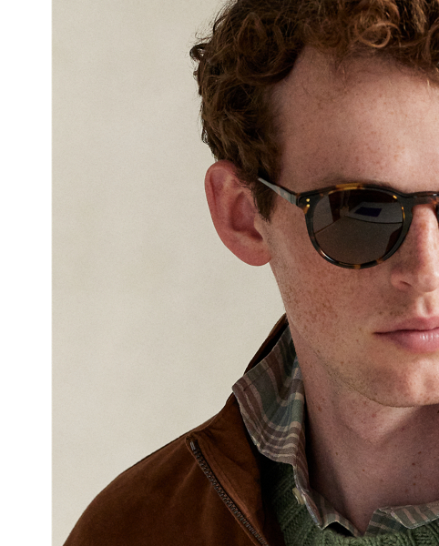 This jacket is crafted with supple suede and lined at the body with stretch jersey for optimal comfort. At the back collar, it features a "Polo by  Ralph Lauren Lauren" logo rendered in the label's original font.