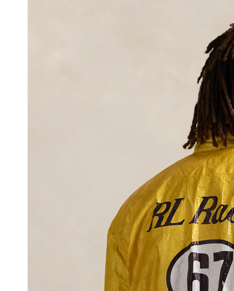 Part of the season's motorsport-inspired collection, this jacket is printed to look like it's embellished with racing patches. It is crafted from a unique crinkled fabric, which is favoured for being durable, breathable and ultra-lightweight.