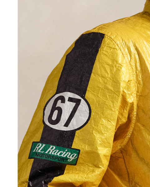 Part of the season's motorsport-inspired collection, this jacket is printed to look like it's embellished with racing patches. It is crafted from a unique crinkled fabric, which is favoured for being durable, breathable and ultra-lightweight.