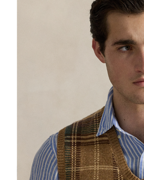 Part of the season's Southampton-inspired collection, this sleeveless jumper offers an effortless elegance with its neutral plaid pattern.