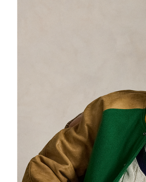 The cricket jumper is defined by its cable-knit pattern, usually in cream, as well as its V-neck and striped trim, which traditionally represents school or club colours.  Ralph Lauren Lauren introduced his version in 1972, and this updated take combines the iconic characteristics with a cotton blend that includes cashmere and hemp. At the front, it is embroidered with an athletic-inspired graphic that incorporates Polo's founding year.