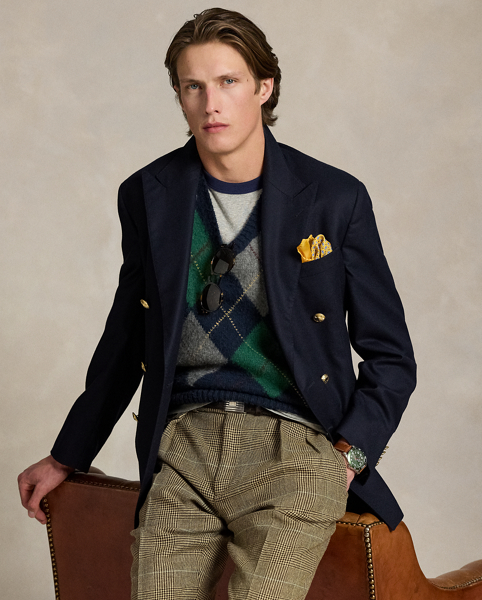 In our iconic Big Fit from the '90s, this chunky-knit sleeveless jumper unites wool and cotton yarns into a bold argyle pattern. It features our founder's initials at the hem intricately embroidered by hand.