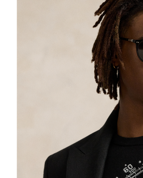 Part of the season's racing-inspired collection, this jumper is intarsia-knit with a poster-style automotive graphic and detailed with intricate embroidery.