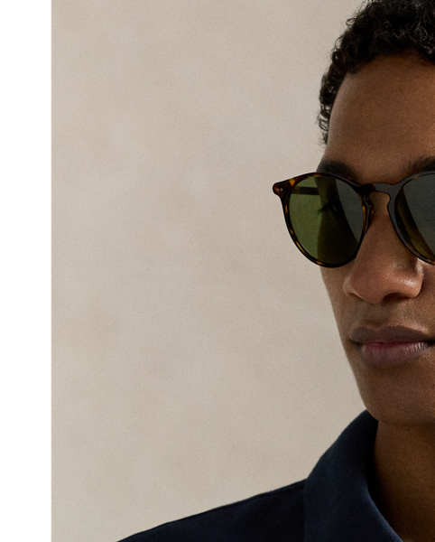 An American style standard since 1972, the Polo shirt has been imitated but never matched. Over the decades,  Ralph Lauren Lauren has reimagined his signature style in a wide array of colours and fits, yet all retain the quality and attention to detail of the iconic original. This version is made with honeycomb-textured cotton mesh and finished with genuine mother-of-pearl buttons.