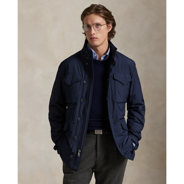 Perfect for travel and on-the-go lifestyles, this jacket packs into its own pocket and can attach to the handle of a suitcase once stored. Its bi-swing construction allows for ease of movement, while its water-repellent fabric and down-alternative fill help to protect you from the elements.