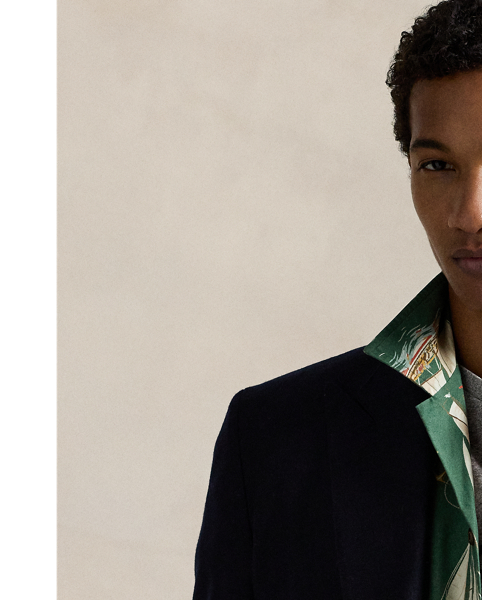 The oxford shirt made its debut very early in  Ralph Lauren Lauren’s designs, and since then, it has solidified its status as a pillar of the Polo look. Our fabric is developed with a secret wash, which gives it instant character, ease and a heathered softness – what we refer to as "the perfect rumple". The formula is so unique that it's been kept in a safe for more than three decades. Today, Mr Lauren continues to create countless variations of his iconic shirt, including this camp-collar version. It features an archival  Ralph Lauren Lauren print from the early aughts: a sailboat motif inspired by mid-20th-century home furnishing patterns.