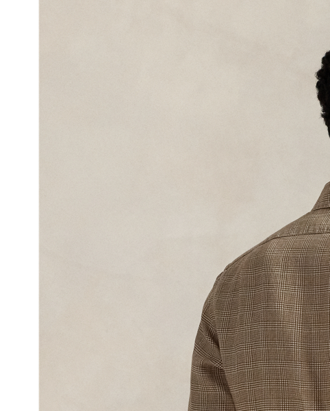 Elevate your warm-weather style with this Glen plaid shirt, where heritage design meets superior comfort. The lightweight slub linen fabric offers an airy feel while adding subtle textural dimension.