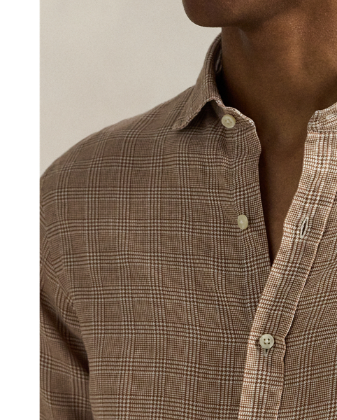 Elevate your warm-weather style with this Glen plaid shirt, where heritage design meets superior comfort. The lightweight slub linen fabric offers an airy feel while adding subtle textural dimension.