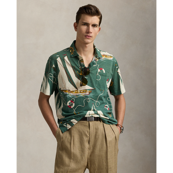 An American style standard since 1972, the Polo shirt has been imitated but never matched. Over the decades, Ralph Lauren Lauren has re-imagined his signature style in a wide array of colours and fits, yet all retain the quality and attention to detail of the iconic original. In gauzy cotton jersey, this version features an archival Ralph Lauren Lauren print from the early noughties: a sailboat motif inspired by mid-20th-century home furnishing patterns.