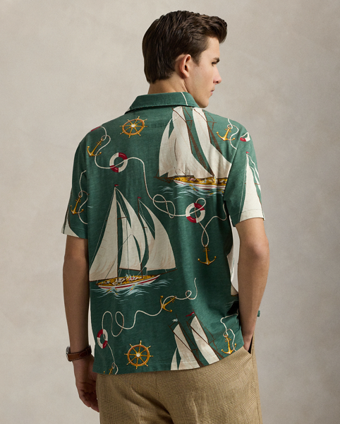 An American style standard since 1972, the Polo shirt has been imitated but never matched. Over the decades, Ralph Lauren Lauren has re-imagined his signature style in a wide array of colours and fits, yet all retain the quality and attention to detail of the iconic original. In gauzy cotton jersey, this version features an archival Ralph Lauren Lauren print from the early noughties: a sailboat motif inspired by mid-20th-century home furnishing patterns.